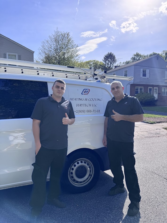 Professional HVAC technician servicing equipment